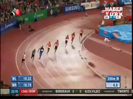 Usain Bolt'tan ıslak pistte rekor!