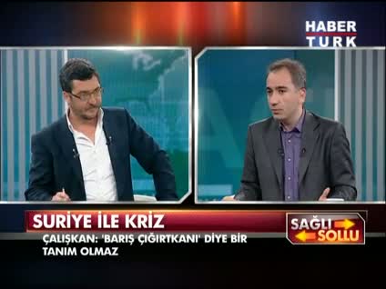 Koray Çalışkan canlı yayında Mustafa Akyol'a oyuncak tank hediye etti!