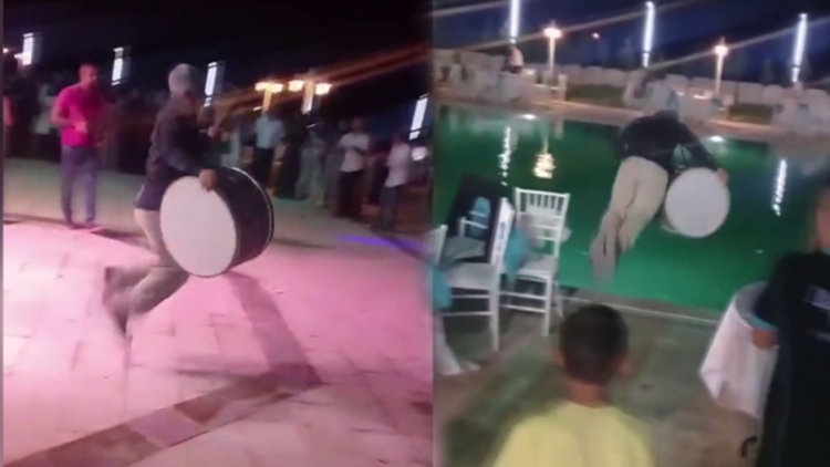 Davul çalarken kendinden geçip havuza atlayan davulcu