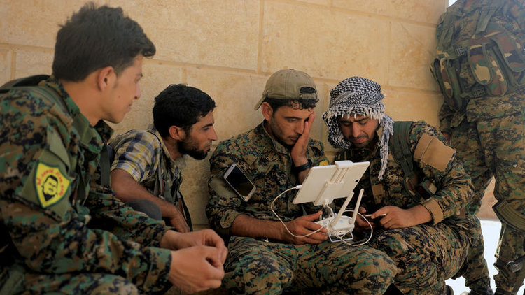 Reuters: Esad, YPG'nin Afrin'e militan sevk etmesine göz yumuyor