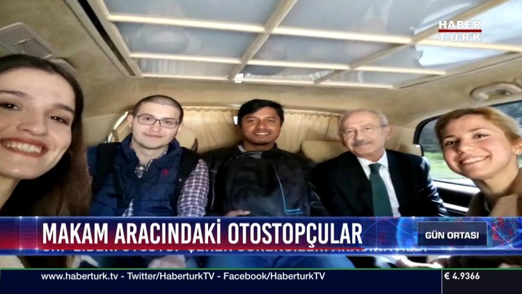 Makam aracındaki otostopçular