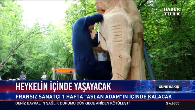 1 hafta heykelin içinde yaşayacak