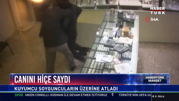 Canını hiçe saydı: Kuyumcu soyguncuların üzerine atladı