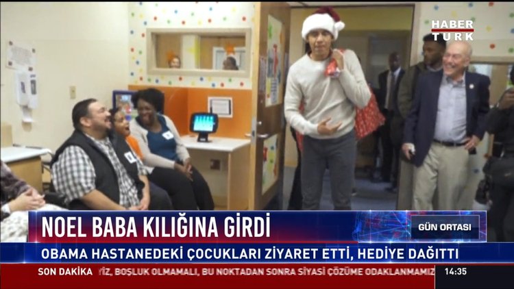 Noel baba kılığına girdi: Obama hastanedeki çocukları ziyaret etti, hediye dağıttı