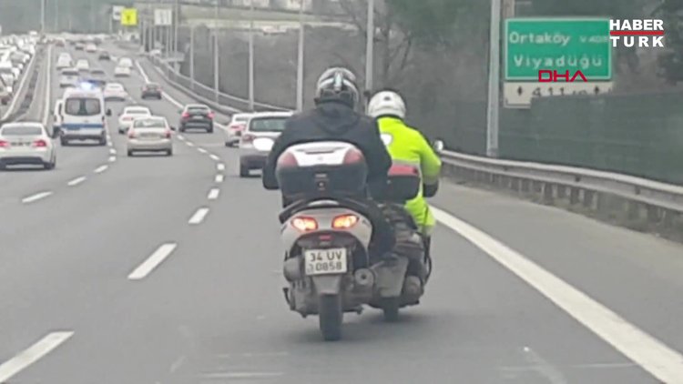 D-100'de tehlikeli yolduculuk! Bozulan motosiklete bacak desteği