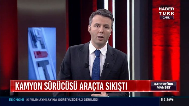 Kamyon sürücüsü araçta sıkıştı