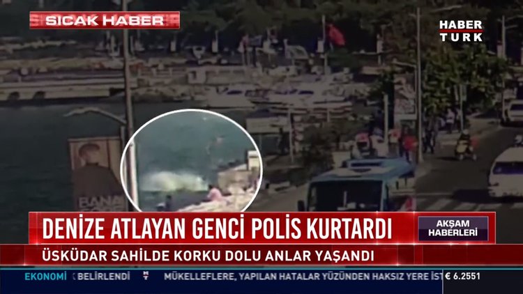 Denize atlayan genci polis kurtardı