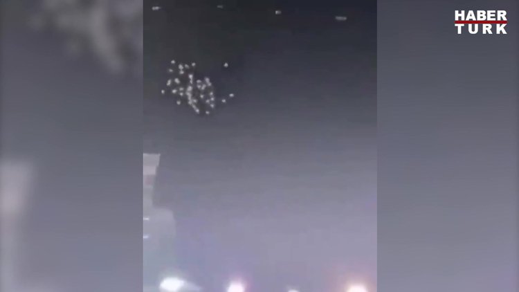 Kabe etrafında tavaf eder gibi uçan kuşlar ilgi uyandırdı