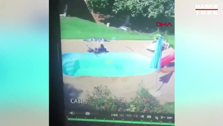 Havuza düşen bir yaşındaki çocuğu arkadaşı böyle kurtardı
