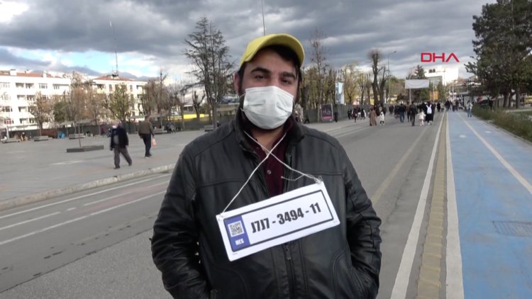 HES kodunu plaka yapıp boynuna astı