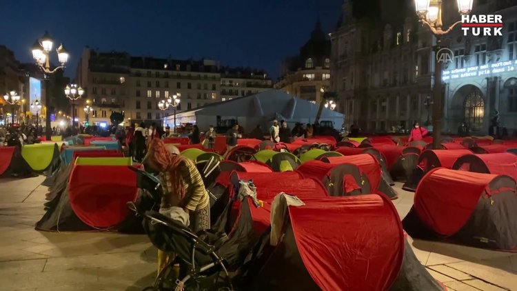 Paris'te çocuklar ve düzensiz göçmenler için acil barınma kampı