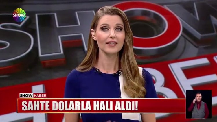 Sahte dolarla halı aldı!
