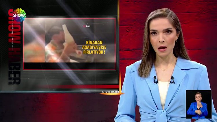 Balkondan şişe fırlattı!