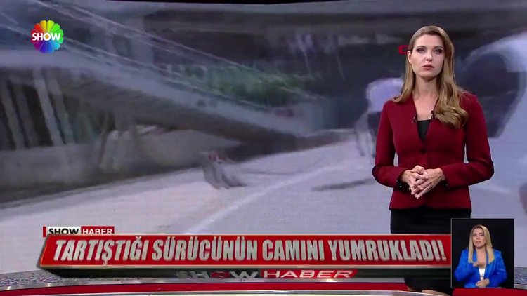 Tartıştığı sürücünün camını yumrukladı!