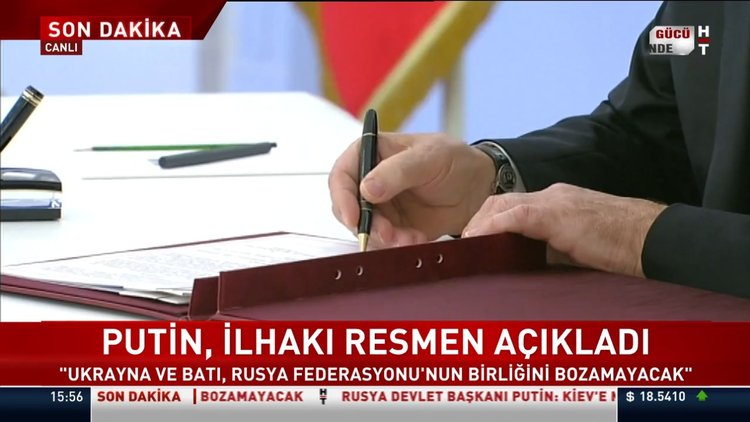 Putin, ilhak kararını canlı yayında imzaladı