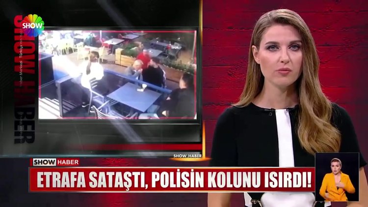 Etrafa sataştı, polisin kolunu ısırdı!