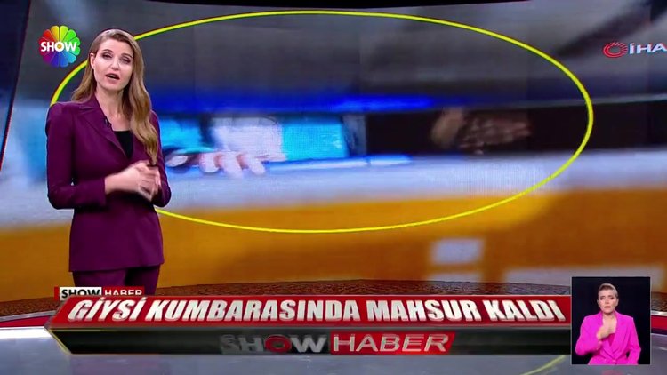 Giysi kumbarasında mahsur kaldı