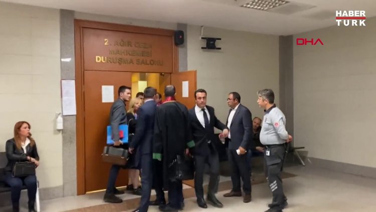 Eşini öldürmeye teşebbüsten yargılanan iş adamı duruşmada avukata omuz atınca tutuklandı