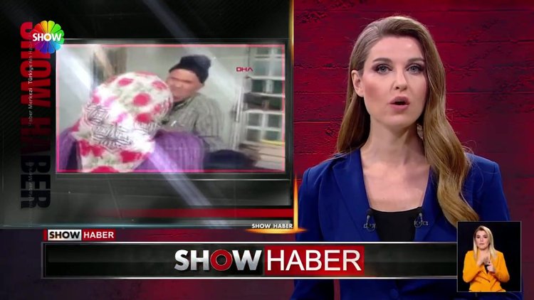 Baltayı acımadan başına indirdi