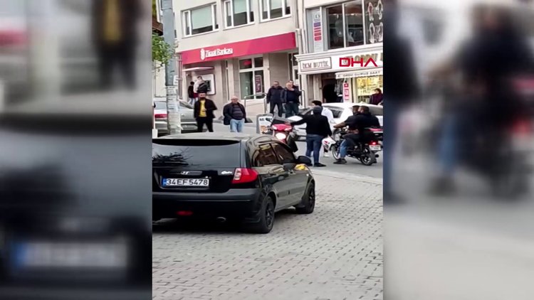 Arnavutköy'de tartıştığı motosikletliyi baltayla tehdit etti