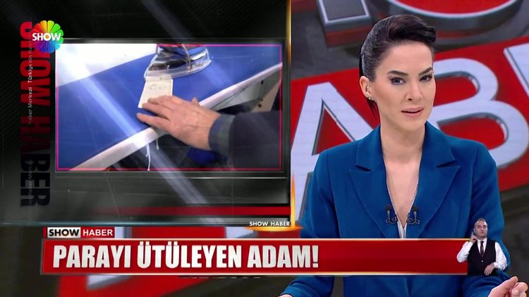 Parayı ütüleyen adam!
