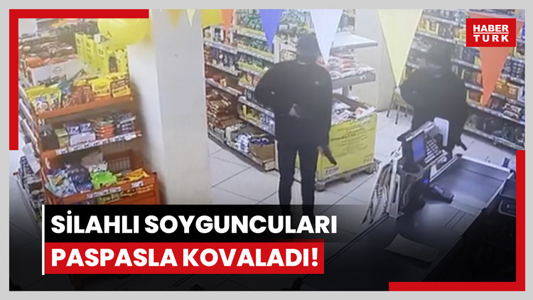 Silahlı soyguncuları paspasla kovaladı!