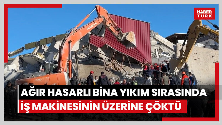 Ağır hasarlı bina yıkım sırasında iş makinesinin üzerine çöktü