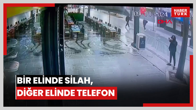 Bir elinde silah, diğer elinde telefon kurşun yağdırdı