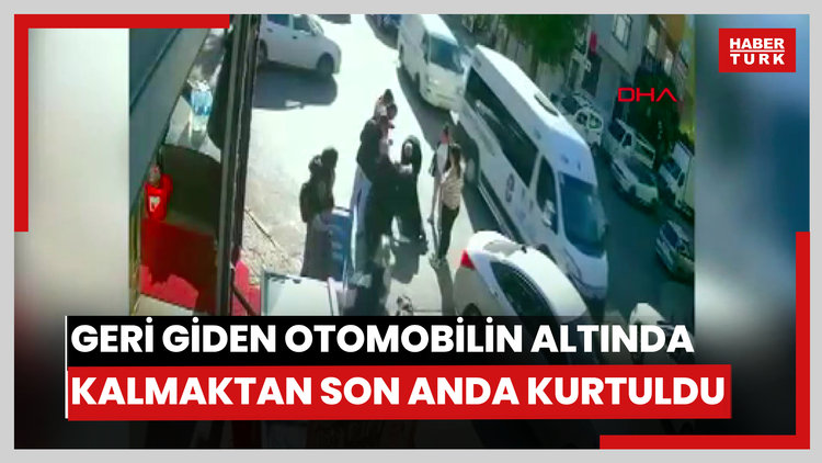 Ataşehir'de geri giden otomobilin altında kalmaktan son anda kurtuldu; kaza kamerada.