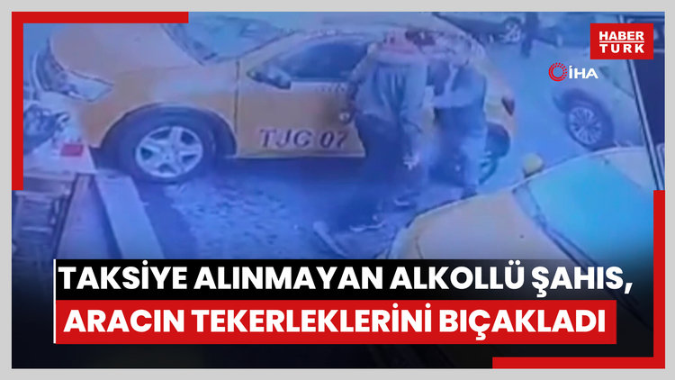 Beyoğlu'nda taksiye alınmayan alkollü şahıs, aracın tekerleklerini bıçakladı: O anlar kamerada