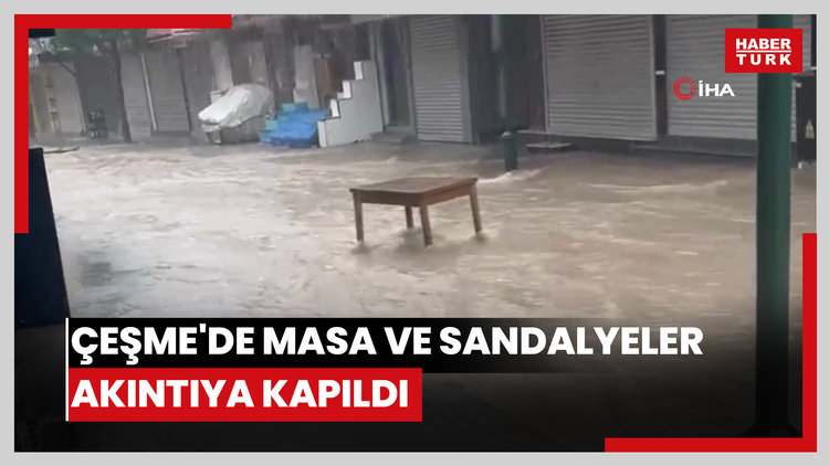 Çeşme'de masa ve sandalyeler akıntıya kapıldı