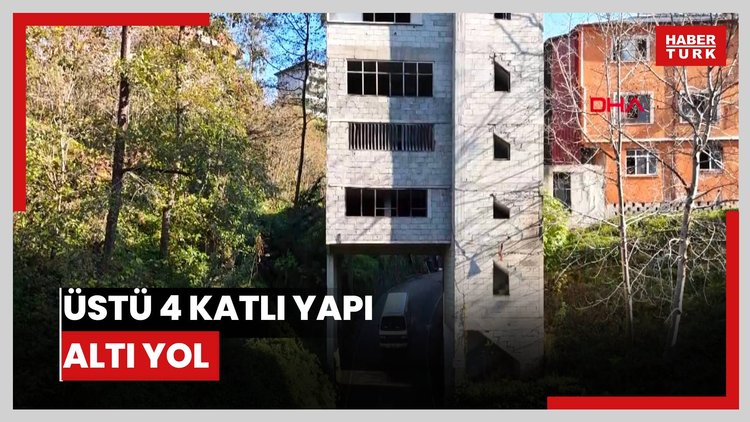 Üstü 4 katlı yapı, altı yol