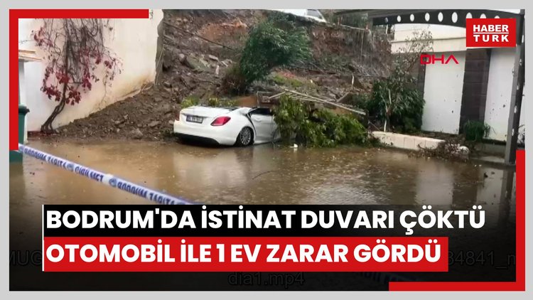 Bodrum'da istinat duvarı çöktü, park halindeki otomobil ile 1 ev zarar gördü