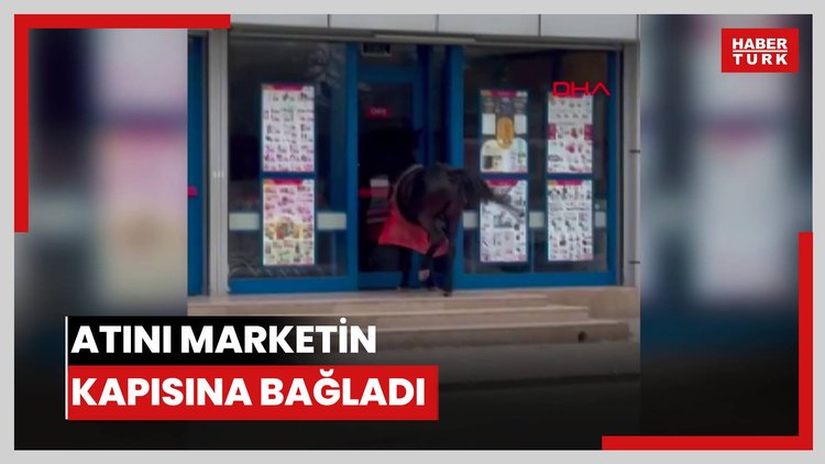 Atını marketin kapısına bağladı