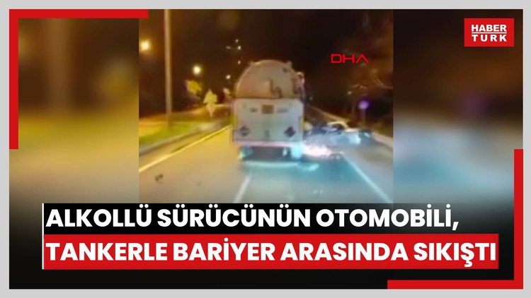 Alkollü sürücünün otomobili, tankerle bariyer arasında sıkıştı