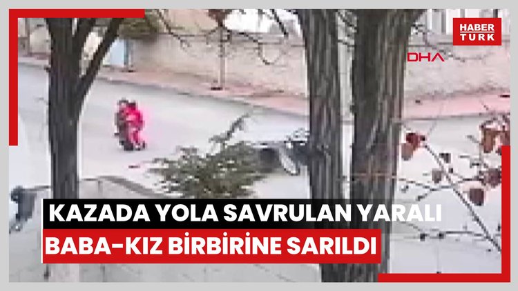 Kazada yola savrulan yaralı baba-kız birbirine sarıldı