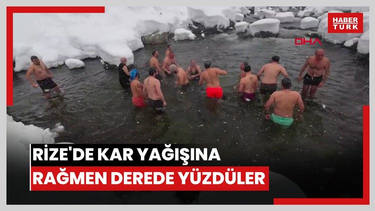 Rize'de kar yağışına rağmen derede yüzdüler