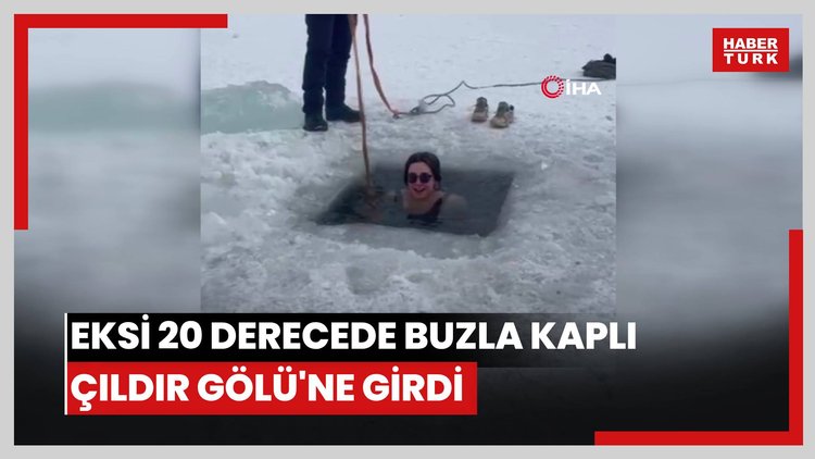 Eksi 20 derecede buzla kaplı Çıldır Gölü'ne girdi