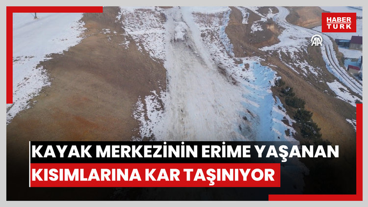Kayak merkezinin erime yaşanan kısımlarına brandayla kar taşınıyor