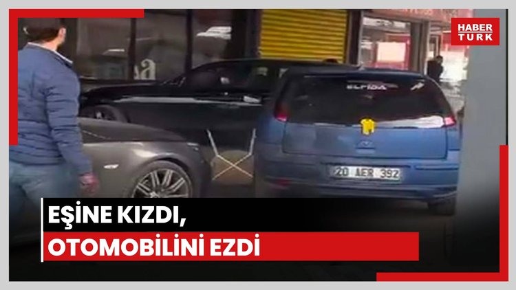 Eşine kızdı, otomobilini ezdi