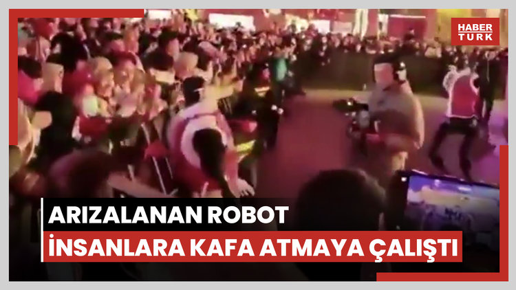 Çin'de arızalanan robot insanlara kafa atmaya çalıştı