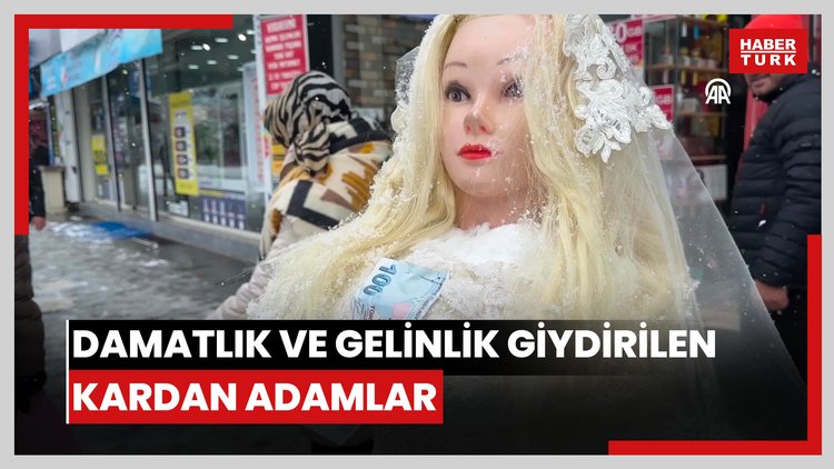 Damatlık ve gelinlik giydirilen kardan adamlar için düğün yapıldı