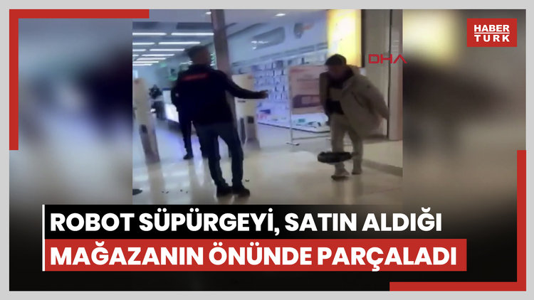 Sık sık arızalanan robot süpürgeyi, satın aldığı mağazanın önünde parçaladı
