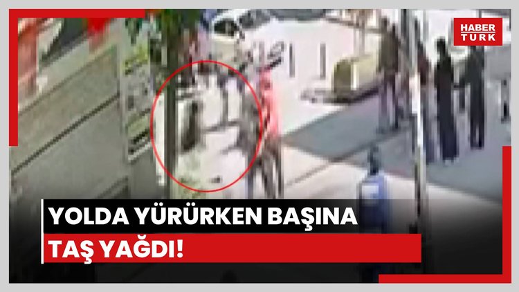Yolda yürürken kafasına taş yağdı!