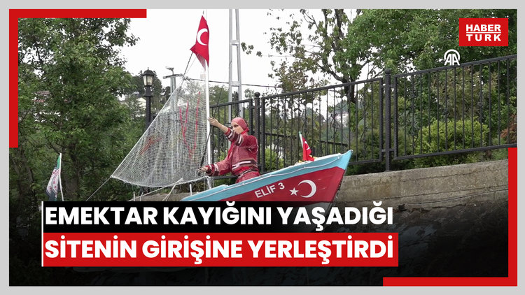 "Gözümün önünde dursun" diye emektar kayığını yaşadığı sitenin girişine yerleştirdi
