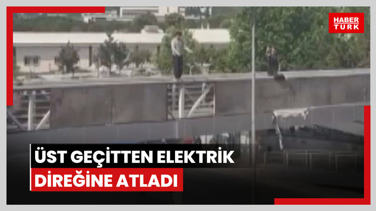 Üst geçitten elektrik direğine atladı