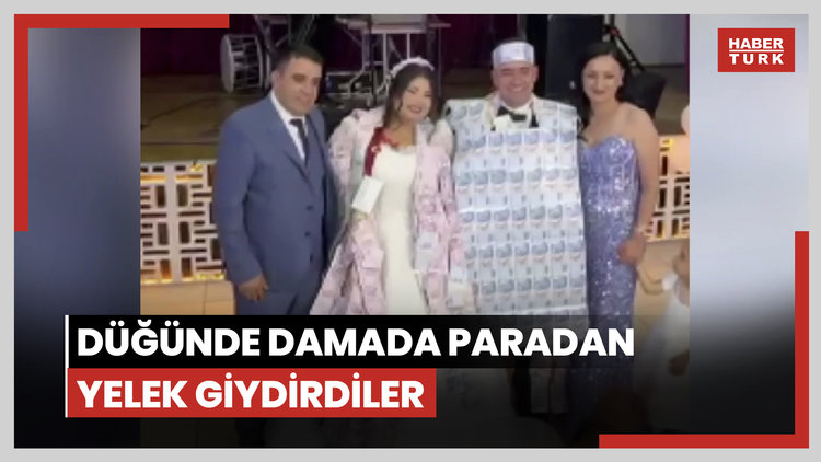 Düğünde damada paradan yelek giydirdiler
