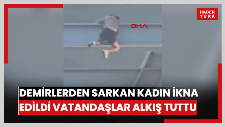 Haliç Metro Köprüsü'nün altındaki demirlerden sarkan kadın ikna edildi; vatandaşlar alkış tuttu