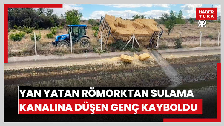 Yan yatan saman yüklü römorktan sulama kanalına düşen genç kayboldu