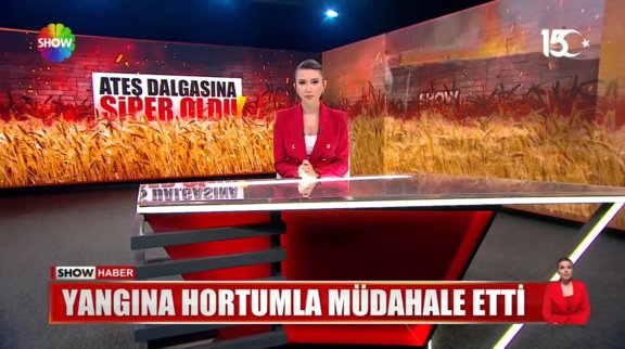 Yangına hortumla müdahale etti! 